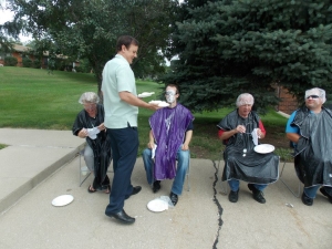 Member pie throwing contest