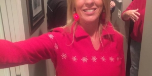 Member in holiday sweater