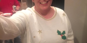 Member in holiday sweater