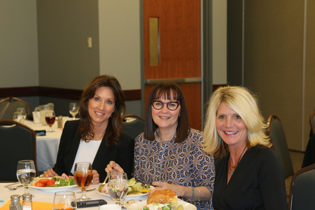 Three members eating lunch