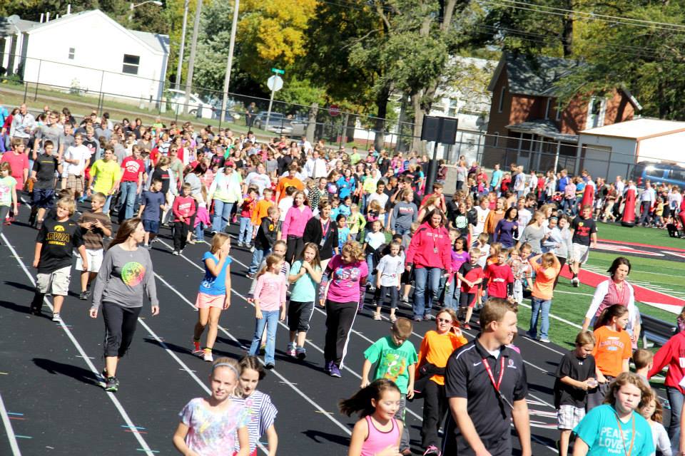 People walking around a track