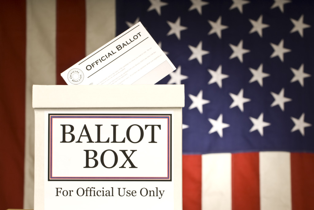 American flag and ballot box