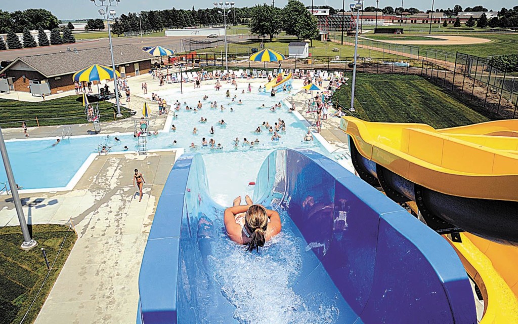 Person on waterslide at city pool