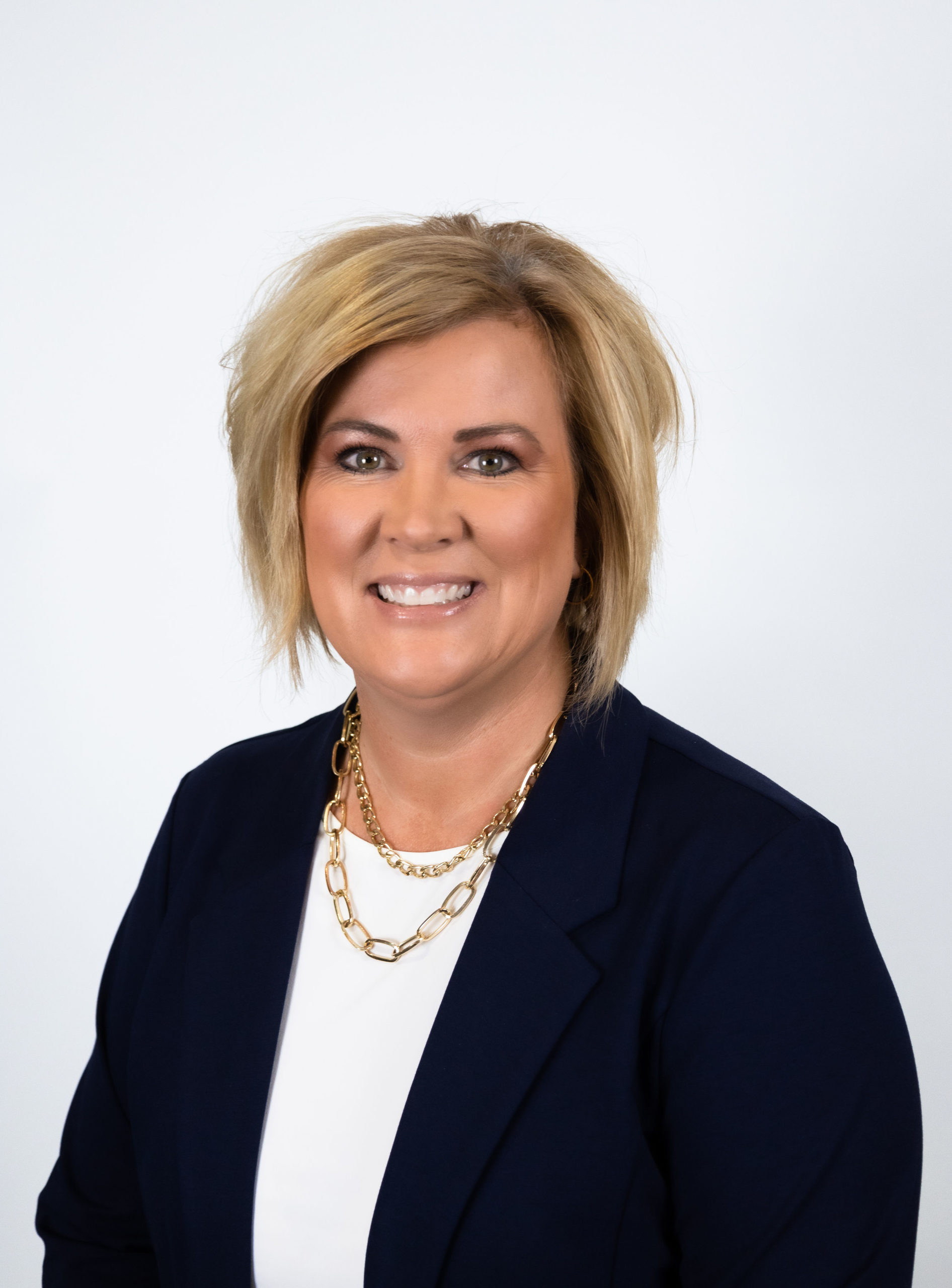 Jen Jansen 2022 Woman smiling in dark jacket